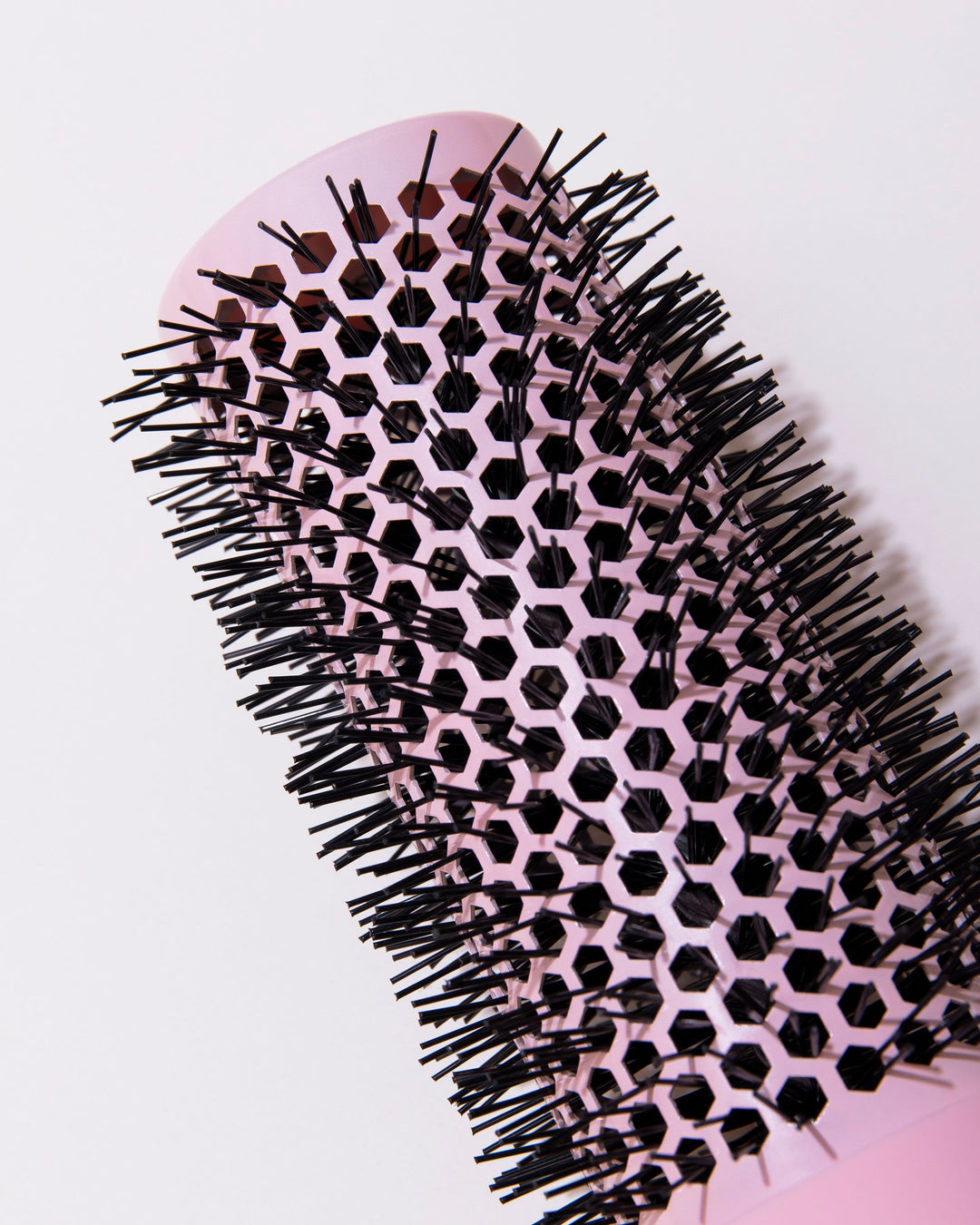 DESIGNME Ceramic Round Brush 1.7" - close-up of the ceramic barrel and bristles