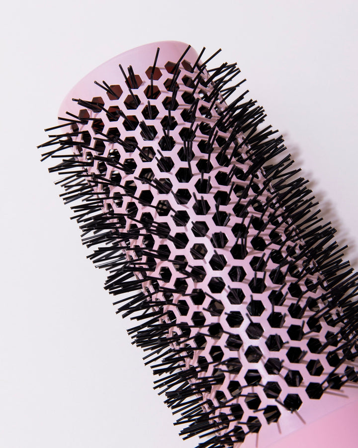 DESIGNME Ceramic Round Brush 1.7" - close-up of the ceramic barrel and bristles