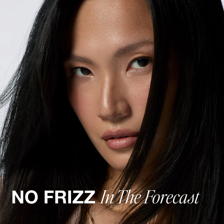 Model with smooth, frizz-free hair after using 3-Day No Frizz Spray