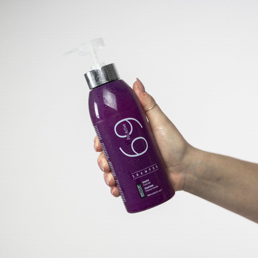 Biotop 69 Pro Active Shampoo - bottle in hand