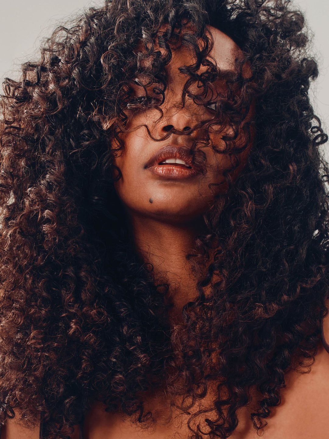 AG Curl Revive Curl Hydrating Shampoo - model with defined curls