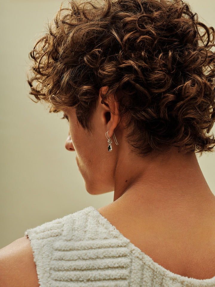 AG Curl Trigger Defining Spray - model with soft defined curls