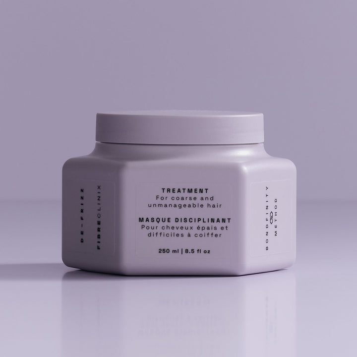 Schwarzkopf Fibre Clinix De-Frizz Treatment - jar on lilac backdrop