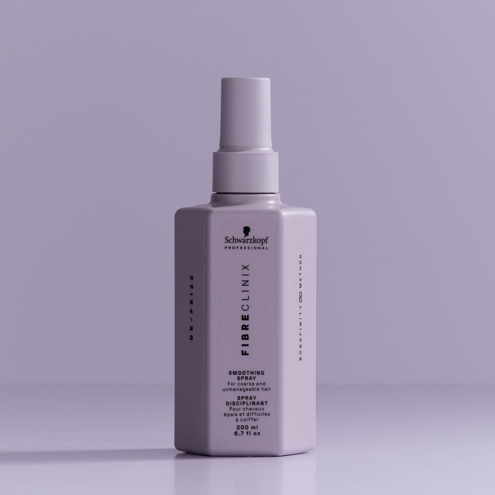 Schwarzkopf Fibre Clinix De-Frizz Smoothing Spray - bottle on lilac backdrop