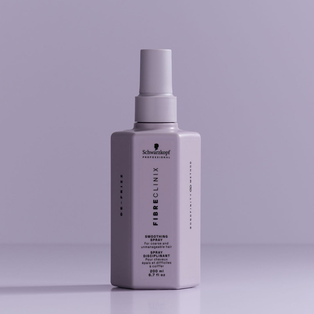 Schwarzkopf Fibre Clinix De-Frizz Smoothing Spray - bottle on lilac backdrop