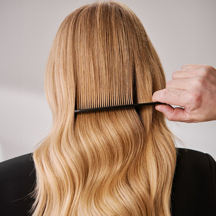 Schwarzkopf Fibre Clinix Fortify Multi-Repair Spray - combing through lengths