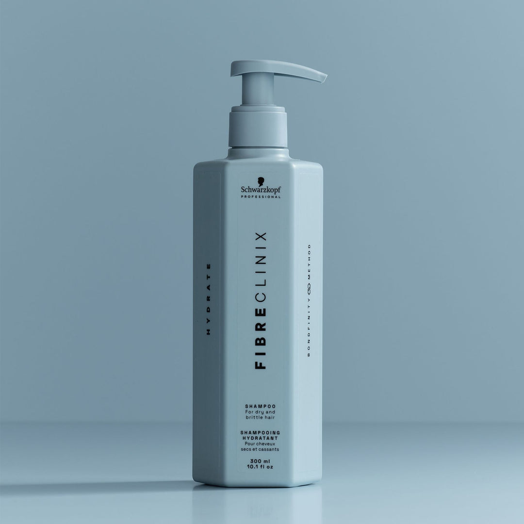 Schwarzkopf Fibre Clinix Hydrate Shampoo - bottle on blue backdrop