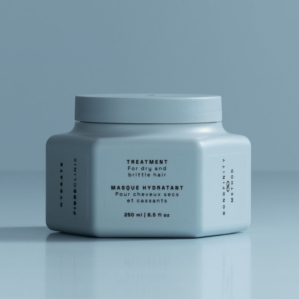 Schwarzkopf Fibre Clinix Hydrate Treatment - jar on blue backdrop