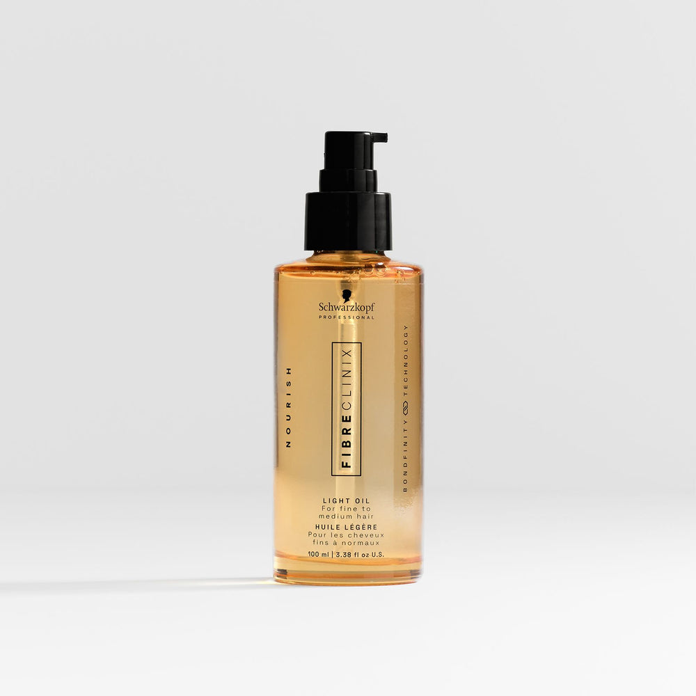 Schwarzkopf Fibre Clinix Bondfinity Light Oil - pumping the oil into the hands