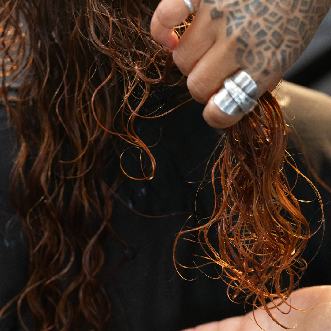 OSiS+ Tipsy Twirl being worked through damp curly hair
