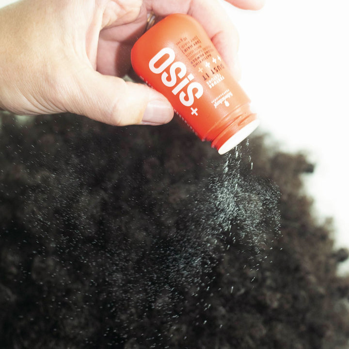 OSiS+ Dust It powder being applied to the roots of dry hair