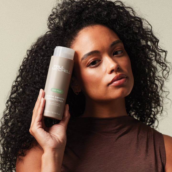 Paul Mitchell Super Smooth Conditioner - model with bottle