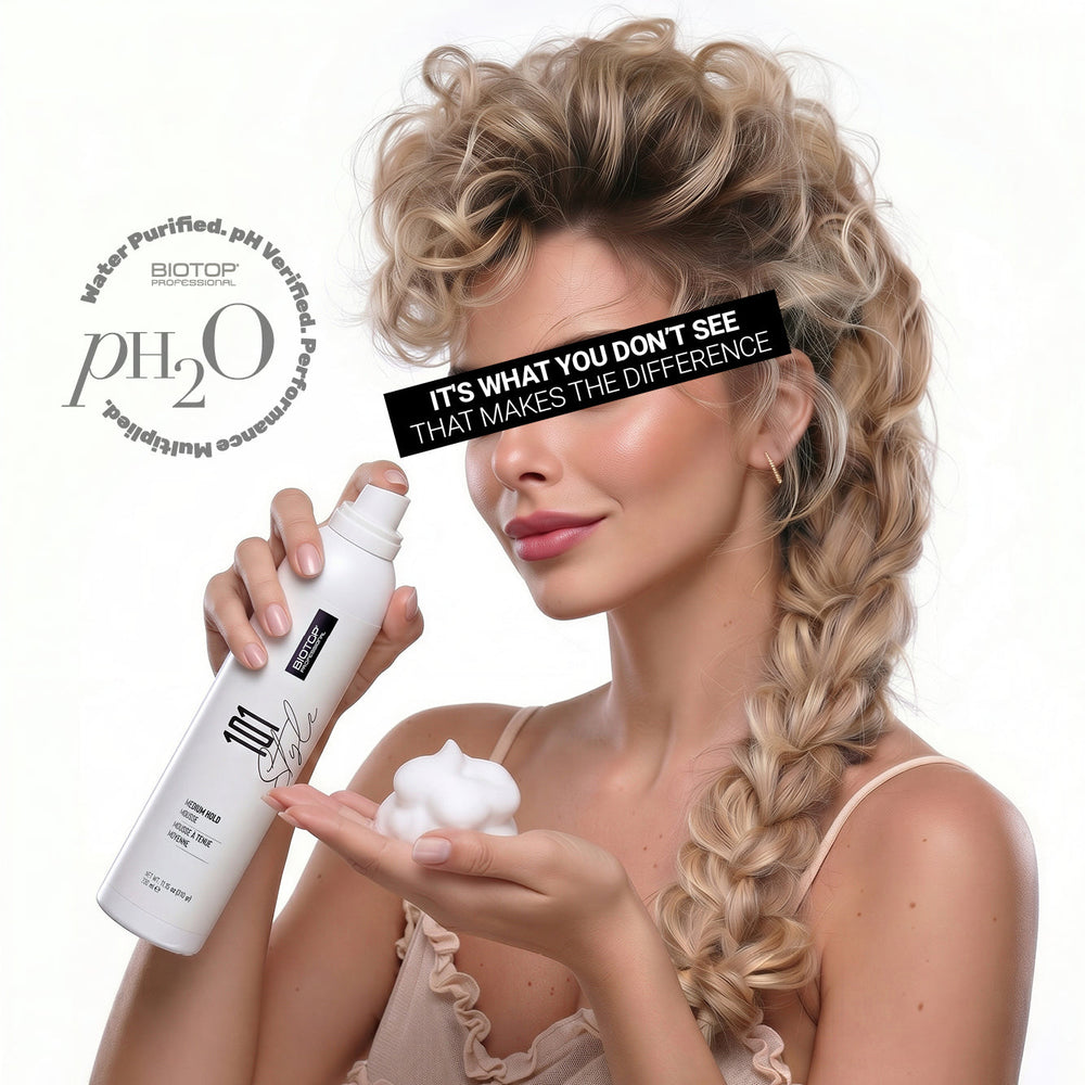 Biotop 101 Create Medium Hold Mousse - model applying the mousse