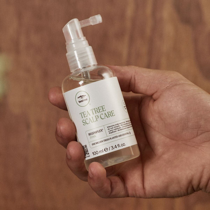 Paul Mitchell Tea Tree Scalp Care Anti-Thinning Tonic - product in hand