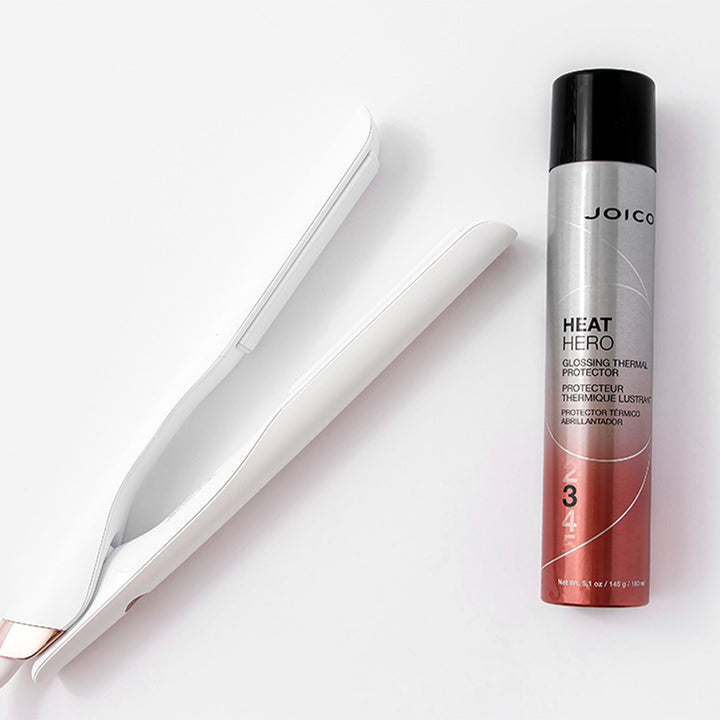 Joico Heat Hero Glossing Thermal Protector - lifestyle with flat iron
