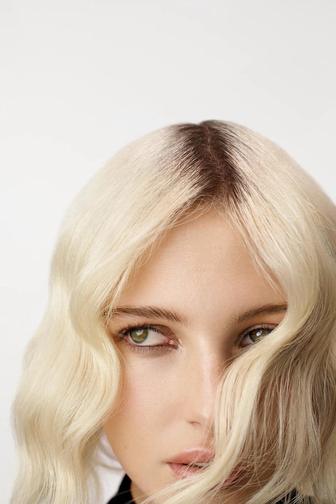 Sebastian Professional No Breaker Bonding & Styling Leave-In Cream - lifestyle model with styled blonde waves