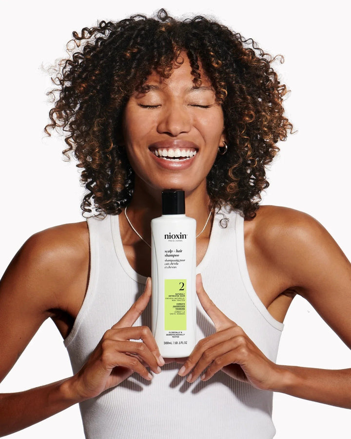 Nioxin System 2 Scalp + Hair Thickening Shampoo - lifestyle