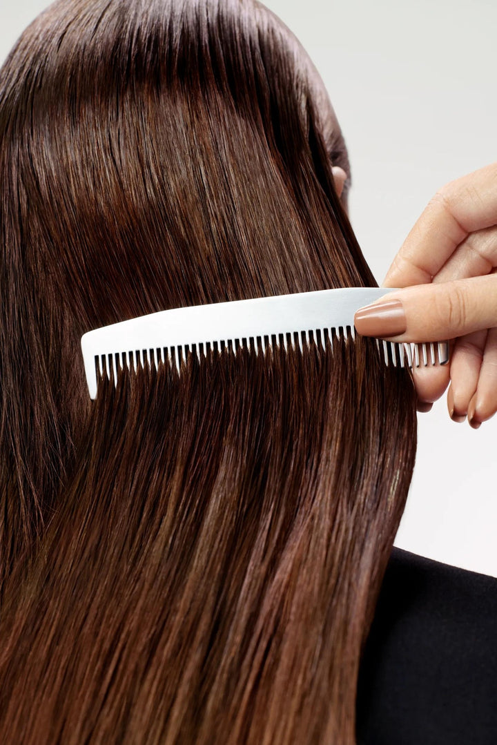 Sebastian Professional Drench Hydrating Shampoo - model with long, smooth hydrated hair